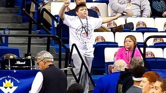 ‘Happy’ dancing boy shows moves at U.S. basketball game 