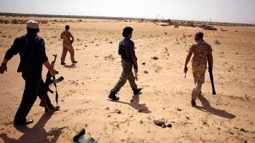Libya Dawn fighters search for Islamic State militants during a patrol near Sirte March 17, 2015. (Reuters)
