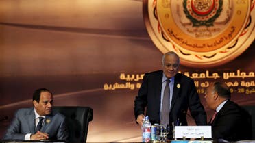Egyptian President Abdel Fattah al-Sisi (L) looks on to Egypt's Foreign Minister Sameh Shoukry (R) and Arab League Secretary-General Nabil Elaraby (C). (Reuters)