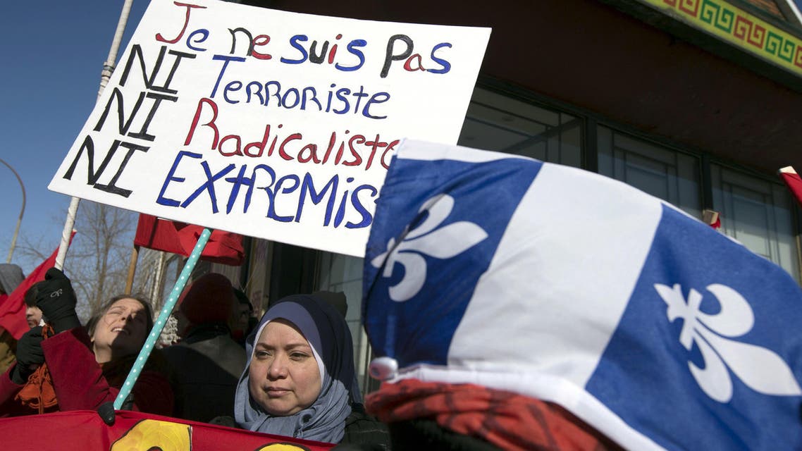 People rally to denounce a planned march by the Patriotic Europeans Against the Islamization of the West (PEGIDA) in Montreal March 28, 2015. (Reuters)