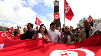 Tunisians march against extremism after attack