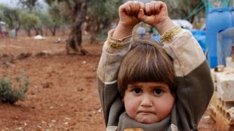 Photo of Syrian girl’s ‘surrender’ to cameraman goes viral  