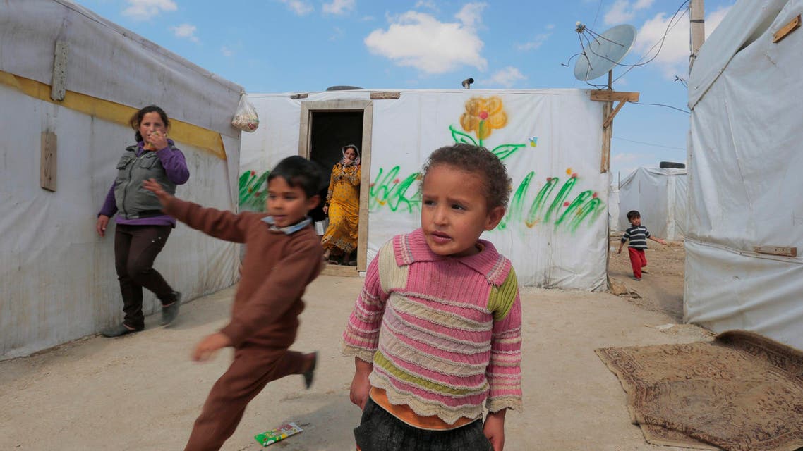 Children play at a makeshift settlement for Syrian refugees in Bar Elias, in the Bekaa valley, March 15, 2015.  (Reuters)