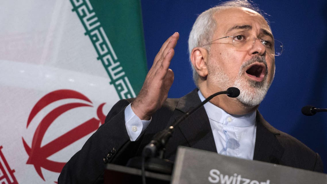 Iranian Foreign Minister Javad Zarif gestures as he speaks during a press conference at the Swiss Federal Institute of Technology in Lausanne (Ecole Polytechnique Federale De Lausanne) on April 2, 2015. (AFP)