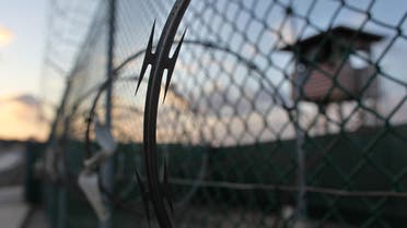 In this May 13, 2009 file photo reviewed by the U.S. military, the sun rises over the Guantanamo detention facility at dawn, at the Guantanamo Bay U.S. Naval Base, Cuba.  (AP)