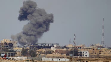  plume of smoke rises above a building during an air strike in Tikrit March 27, 2015. (File: Reuters)