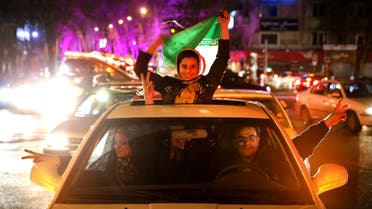 Iranians celebrate on a street in northern Tehran, Iran, Thursday, April 2, 2015, after Iran's nuclear agreement with world powers in Lausanne, Switzerland. (AP)