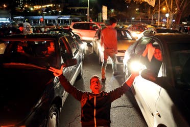 Iranians celebrate on a street in northern Tehran, Iran, Friday, April 3, 2015, after Iran's nuclear agreement with world powers in Lausanne, Switzerland. (AP)