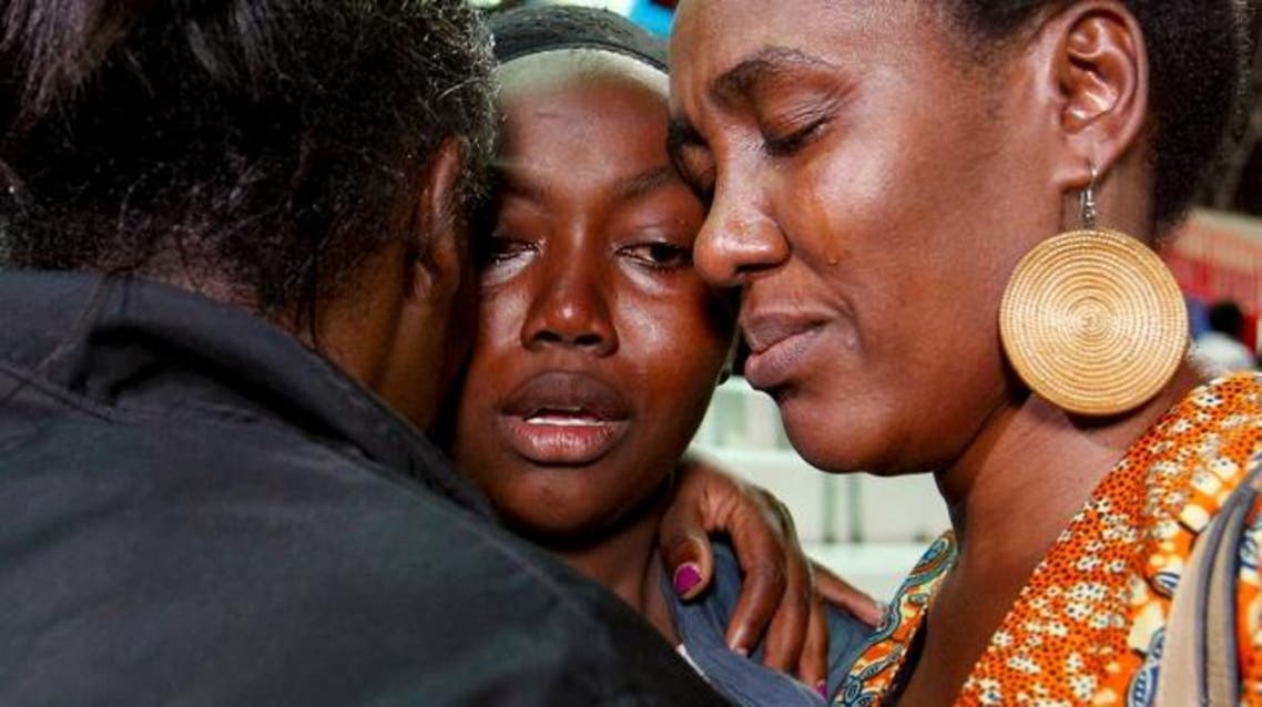 People react after meeting their relative (C) who was rescued from the Garissa University attack at Nyayo stadium in Kenya's capital Nairobi April 4, 2015. (Reuters)