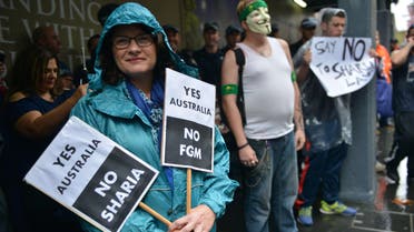 Protesters attend a “Reclaim Australia” rally to oppose religious extremism in Sydney on April 4, 2015. 