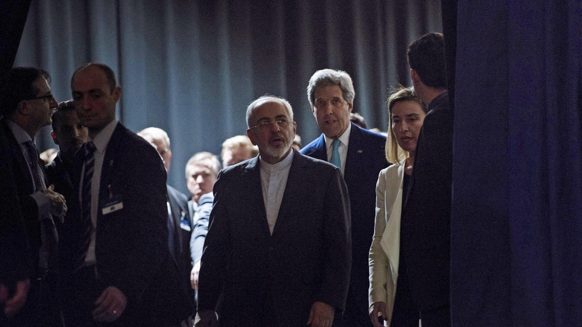 Iranian Foreign Minister Zarif, U.S. Secretary of State Kerry and EU High Representative Mogherini arrive to deliver statements after nuclear talks in Lausanne