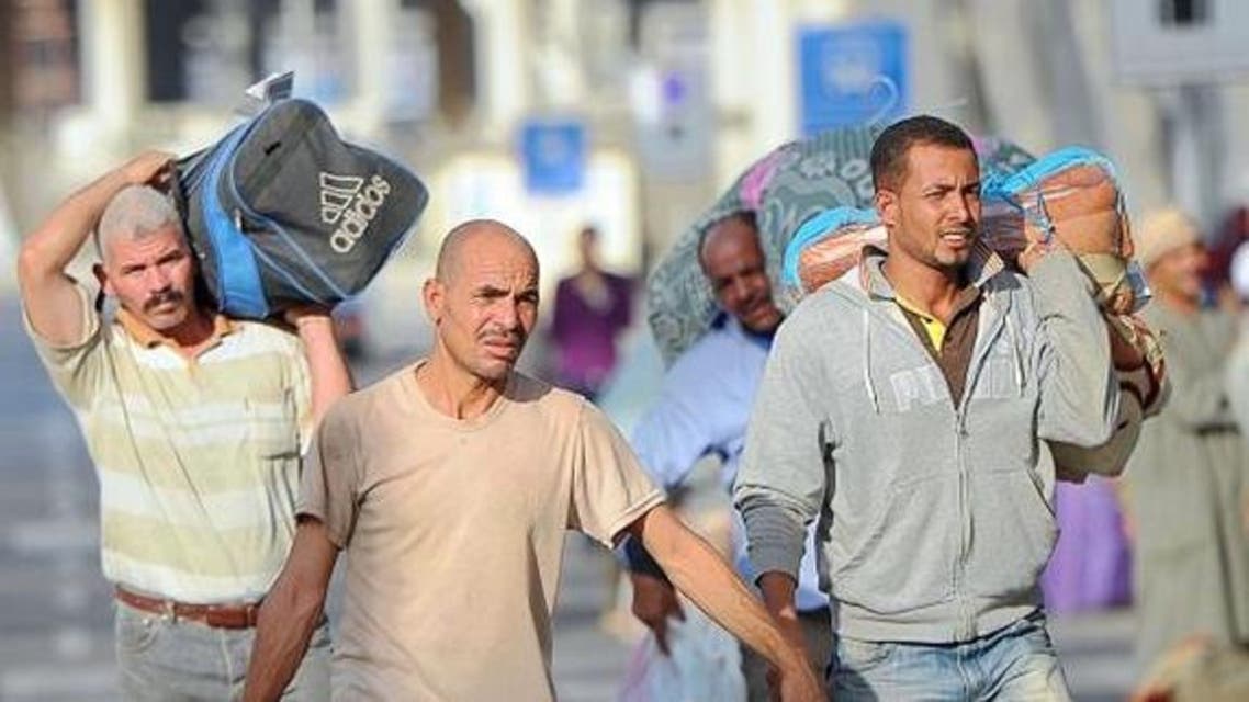 عمال مصريون عائدون من اليمن