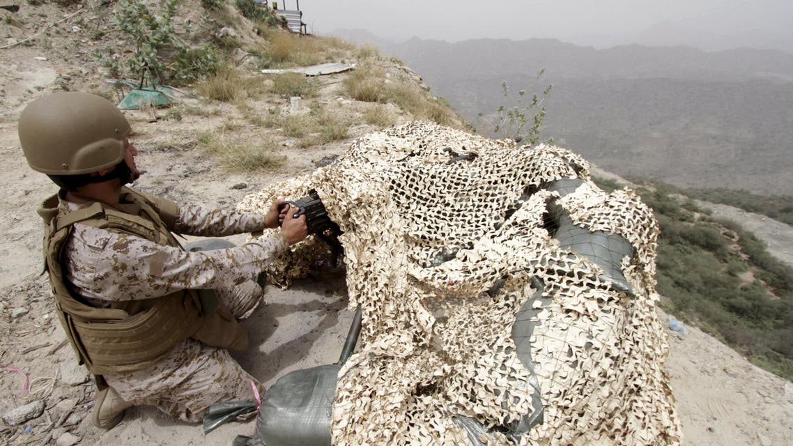 A Saudi soldier takes his position at Saudi Arabia's border with Yemen