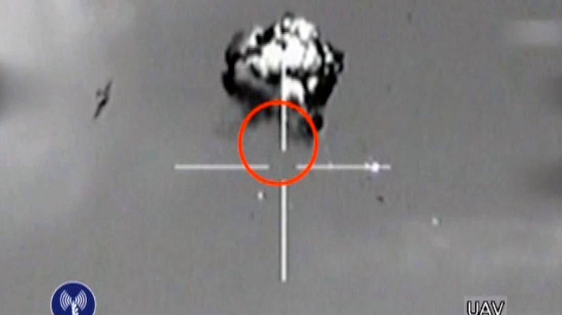 Saturday, Oct. 6, 2012 file image made from video released by the Israeli Defense Forces shows the downing of a drone that entered Israeli airspace in southern Israel. Iran has images of sensitive Israeli military bases taken by a drone that was launched by Lebanon's Hezbollah movement and downed by Israel earlier this month, a senior Iranian lawmaker claimed Monday Oct. 29 2012 in the latest boast from Tehran about purported advances in the capabilities of its unmanned aircraft. The announcement gave no details about the photos — other than calling the Israeli bases "forbidden sites" — but it suggested Iranian drones have the ability to transmit data while in flight. It also appeared aimed at warning Israel about the options for retaliation for any possible strikes on Iranian nuclear sites. (AP Photo/Israeli Defense Forces via AP video, File)