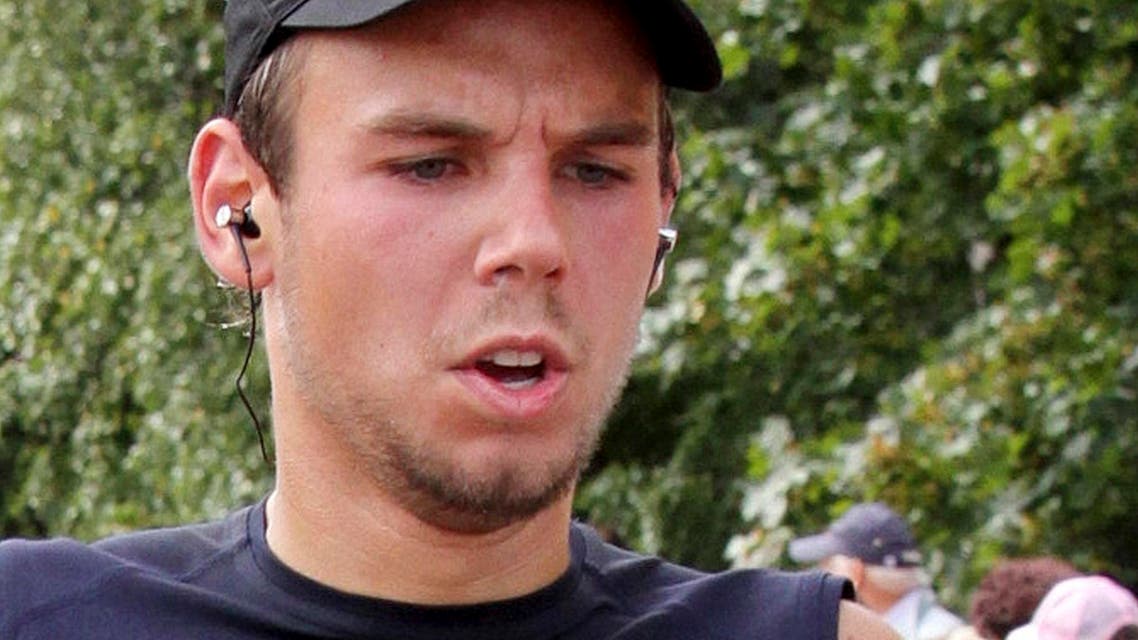 In this Sunday, Sept. 13, 2009 photo Andreas Lubitz competes at the Airportrun in Hamburg, northern Germany. Germanwings co-pilot Andreas Lubitz appears to have hidden evidence of an illness from his employers, including having been excused by a doctor from work the day he crashed a passenger plane into a mountain, prosecutors said Friday, March 27, 2015. The evidence came from the search of Lubitz's homes in two German cities for an explanation of why he crashed the Airbus A320 into the French Alps, killing all 150 people on board. (AP Photo/Michael Mueller)