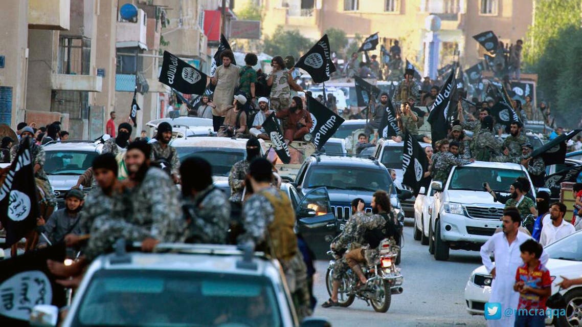 An undated image posted by the Raqqa Media Center of the ISIS group shows ISIS fighters parading in Raqqa, north Syria. (File Photo: AP)