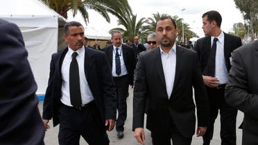 Dr. Saleh Almkhozom, Second Deputy Chairman of the Libyan General National Congress, walks escorted by bodyguards outside the Palais des Congress of Skhirate 30 km south of Rabat, Morocco, Friday, March 20, 2015. (File: AP)