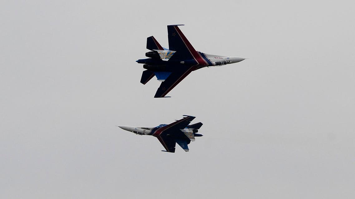 A file photo of two Su-27 fighter jets of the Russian pilot group Russian Knights perform at the the MAKS Air Show in Zhukovsky outside Moscow. (AP)