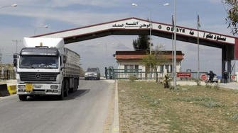Lebanon truckers trapped in Syria crossing return home 