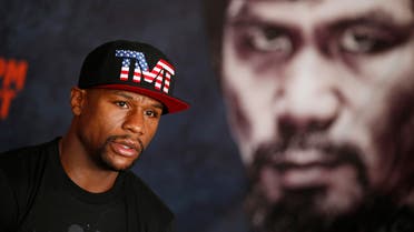 Boxer Floyd Mayweather Jr. speaks with the media before a workout Tuesday, April 14, 2015, in Las Vegas. Mayweather will face Manny Pacquiao in a welterweight boxing match in Las Vegas on May 2. (AP Photo/John Locher)