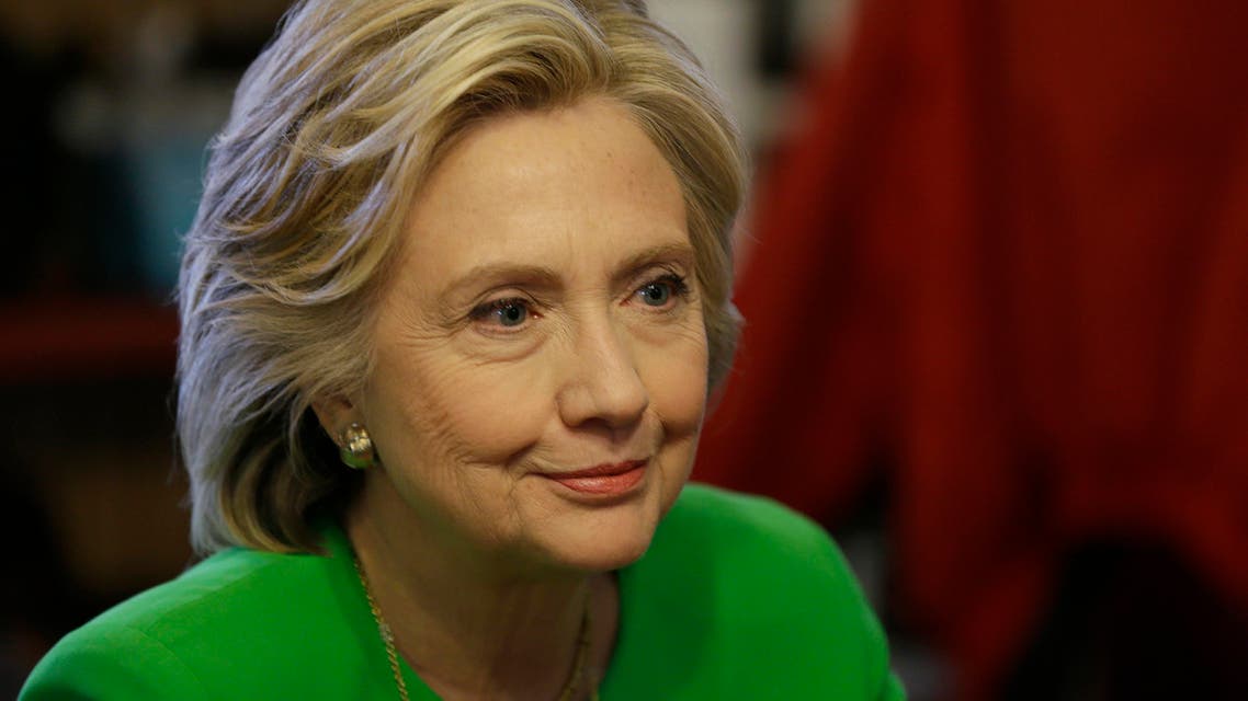 Democratic presidential candidate Hillary Rodham Clinton meets with local residents at the Jones St. Java House, Tuesday, April 14, 2015, in LeClaire, Iowa. (AP Photo/Charlie Neibergall)