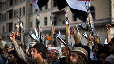 Shiite rebels, known as Houthis, hold up their weapons as they attend a protest against Saudi-led airstrikes in Sanaa, Yemen, Friday, April 10, 2015.  (AP)