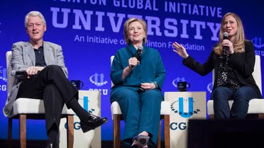 Former U.S. President Bill Clinton (L to R), former Secretary of State Hillary Clinton, and Vice Chair of the Clinton Foundation, Chelsea Clinton, discuss the Clinton Global Initiative University during the closing plenary session on the second day of the 2014 Meeting of Clinton Global Initiative University at Arizona State University in Tempe, Arizona in this March 22, 2014 file photo
