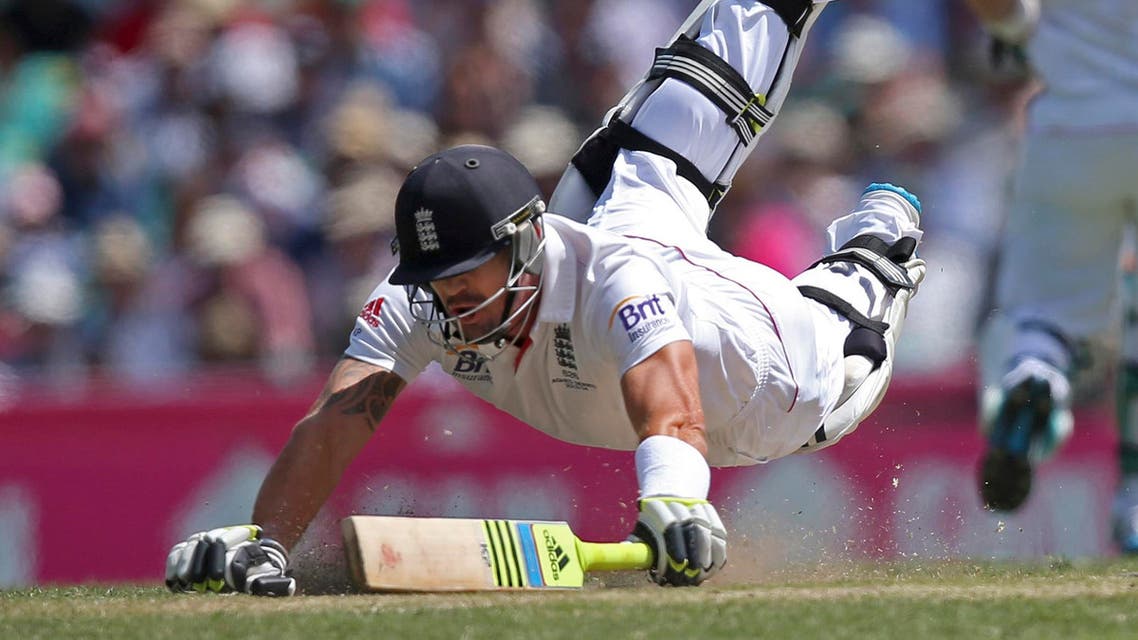 England's Kevin Pietersen dives to make his ground during a runout attempt by Australia, during their Ashes cricket Test match at the Sydney Cricket Ground in Sydney, in this file photo dated Saturday, Jan. 4, 2014. Pietersen's England career appears to be over, it is announced Tuesday Feb. 4, 2013, after the brash batsman was not selected for the upcoming tour of West Indies. Pietersen has attracted controversy during his playing career and accused of being a divisive influence within the England team, but he went on to play 104 Test matches, 136 one-day games and 37 Twenty20 fixtures for England. (AP Photo/Rick Rycroft, FILE)