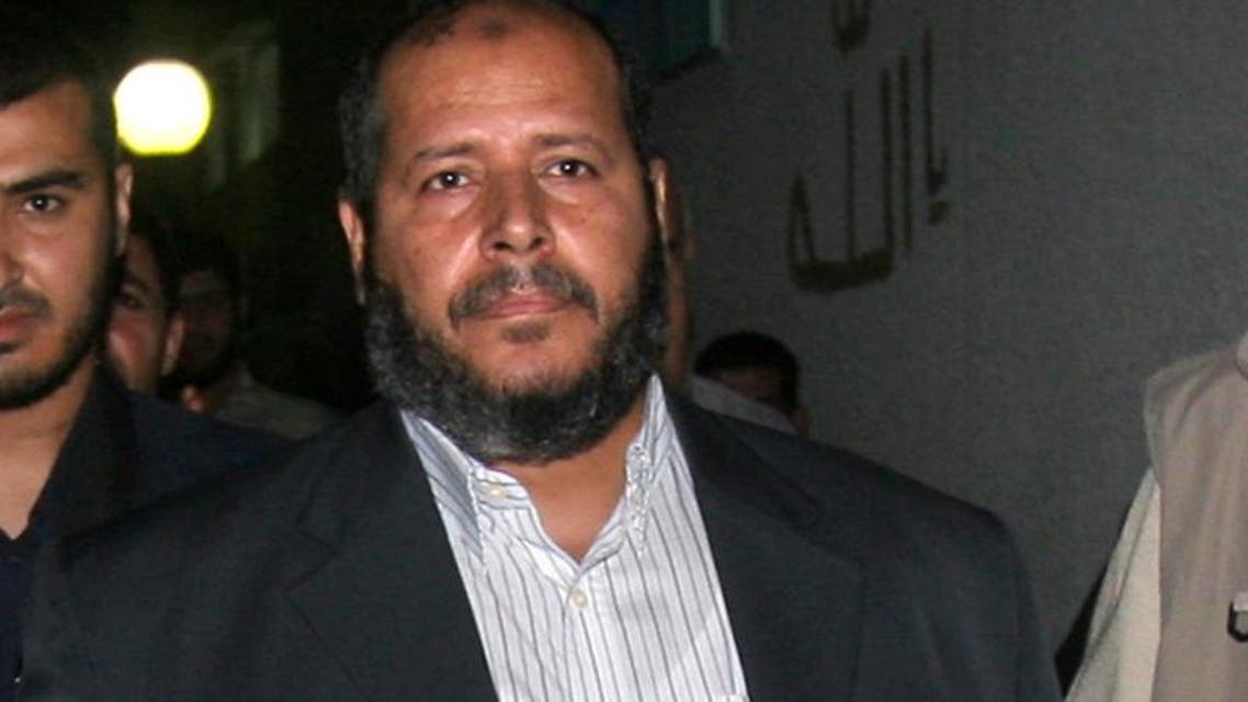 Hamas lawmaker Khalil al-Haya, center, arrives at Shifa Hospital to visit the morgue where family members killed in an Israeli missile strike were brought in Gaza City, Sunday, May 20, 2007. The Israeli air force fired a missile at a house in Gaza City late Sunday, killing at least eight people, residents and hospital officials said, in the deadliest attack since Israel started hitting back for rocket salvos last week. It followed a decision to step up the counterstrikes. The apparent target of the deadly airstrike, Hamas lawmaker Khalil al-Haya, was not at home and was unharmed. At least six of the dead were his relatives, residents said. At least 13 people were wounded. (AP Photo/Adel Hana)