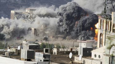 Smoke billows during an air strike on the Republican Palace in Yemen's southwestern city of Taez. (Reuters)