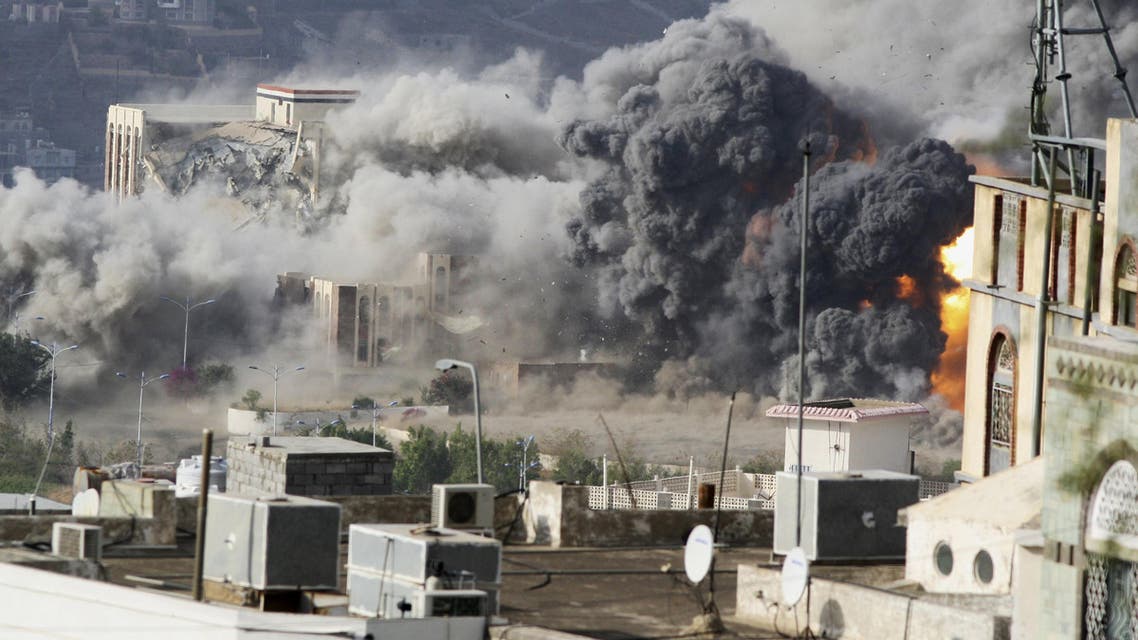 Smoke billows during an air strike on the Republican Palace in Yemen's southwestern city of Taez. (Reuters)