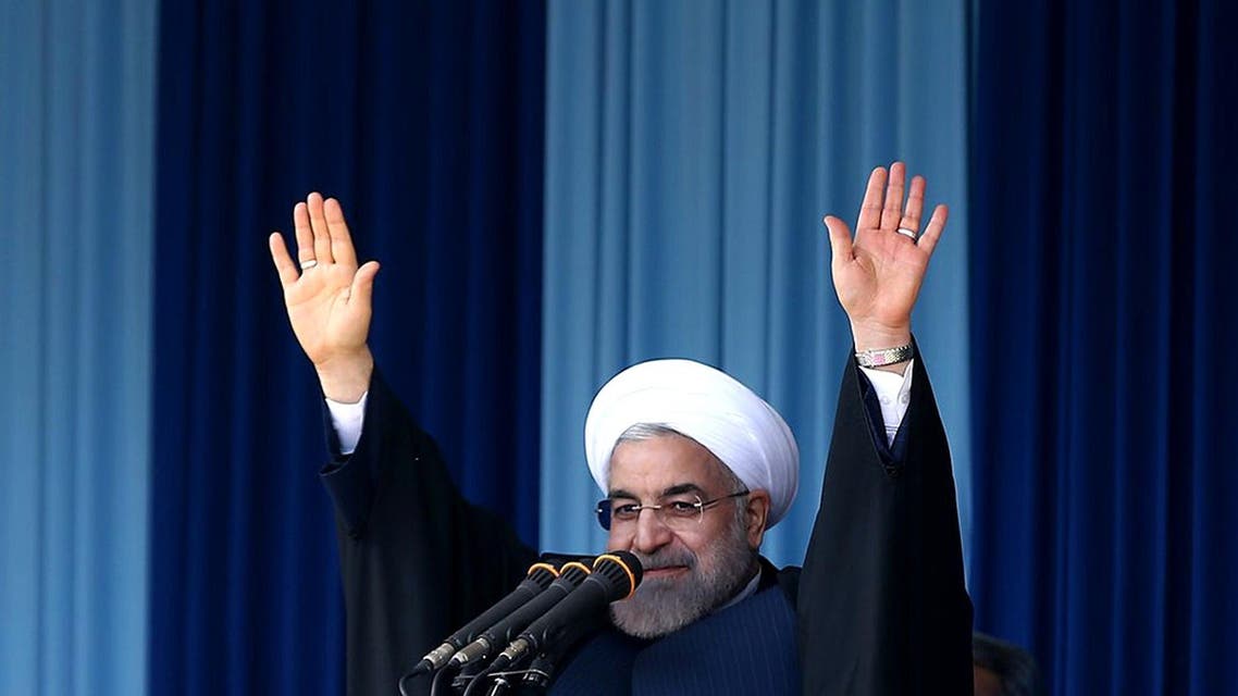 A handout picture released by the official website of the Iranian President Hassan Rouhani shows him waving to the crowd during a public meeting in the northern city of Rasht on April 15, 2015. (File: AFP)