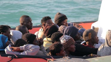 Migrants on a Coast Guard dinghy boat arrive at the Sicilian Porto Empedocle harbor, Italy, Monday, April 13, 2015. (Reuters)