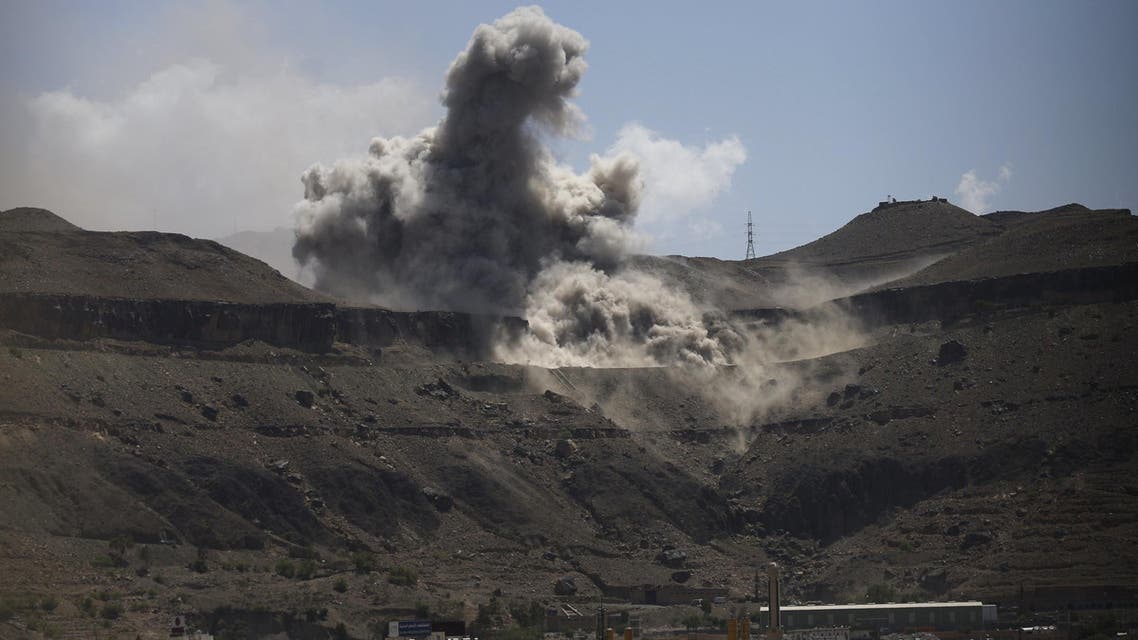 2Dust rises from the site of army weapons depots hit by an air strike in Sanaa April 18, 2015. (Reuters)