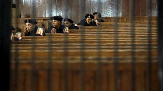 Egypt refers Islamist cleric, dozens of others to military trial 