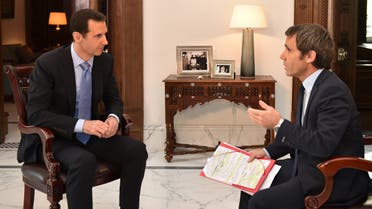 Syrian President Bashar al-Assad answering questions from France 2 journalist David Pujadas during an interview in Damascus. (AFP)