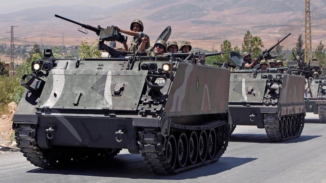 Lebanese army reinforcements arrive to the outskirts of Arsal, a predominantly Sunni Muslim town near the Syrian border in eastern Lebanon, Monday, Aug. 4, 2014. (AP)