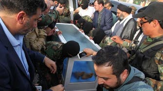  ‘Body of Saddam Hussein aide’ paraded in glass coffin