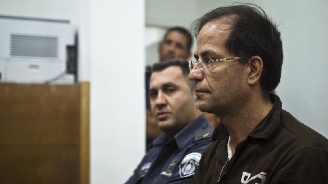 Ali Mansouri, a Belgian-Iranian dual national, sits in a courtroom at the magistrate's court in Petah Tikva near Tel Aviv. (File: Reuters)
