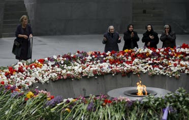 People mourn at the Tsitsernakaberd Armenian Genocide Memorial Museum in Yerevan, April 21, 2015. (Reuters)