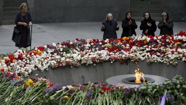 People mourn at the Tsitsernakaberd Armenian Genocide Memorial Museum in Yerevan, April 21, 2015. REUTERS