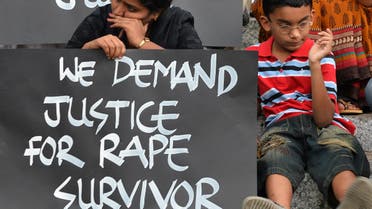 Activists from various women's rights organisation and children stage a silent demonstration against sexual assault and rapes on women, in Bangalore on April 22, 2015. (File Photo:AFP)