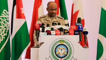Saudi military spokesman Ahmed Asiri briefs journalists on the Saudi-led coalition's strikes on Houthi rebels in Yemen, during a press conference, in Riyadh, Saudi Arabia, Tuesday, April 14, 2015. (AP