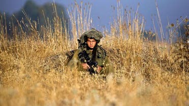 Israeli soldiers from the Golani Brigade take part in a military exercise in the Israeli-annexed Golan Heights near the border with Syria. (AFP)