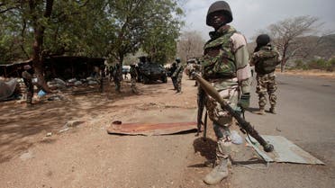 Nigerian Soldiers man a check point in Gwoza, Nigeria, a town newly liberated from Boko Haram. AP