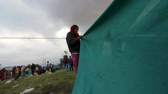 Thousands of Nepalese huddle under tents
