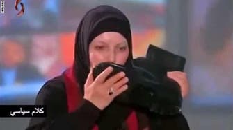 Tunisian journalist courts controversy by kissing Syrian soldier’s shoe 