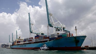 A Maersk freighter is loaded with shipping containers at the Port of Miami in Miami, Friday, May 18, 2012. (AP)