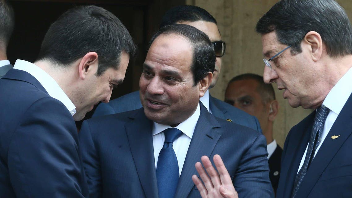 Cypriot President Nicos Anastasiades (R), Greek Prime Minister Alexis Tsipras (L) and Egyptian President Abdel Fattah al-Sisi speaking following a joint press conference at the Presidential Palace in Nicosia on April 29, 2015. (AFP)