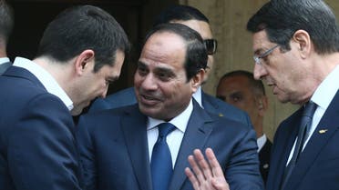 Cypriot President Nicos Anastasiades (R), Greek Prime Minister Alexis Tsipras (L) and Egyptian President Abdel Fattah al-Sisi speaking following a joint press conference at the Presidential Palace in Nicosia on April 29, 2015. (AFP) 